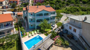 Apartments and rooms with a swimming pool Senj - 23592